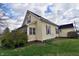 Charming home exterior with a well-maintained lawn and mature landscaping at 609 E Columbus St, Martinsville, IN 46151