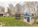 Spacious backyard featuring a trampoline, playhouse, and plenty of room to play at 6133 Buttonwood Dr, Noblesville, IN 46062