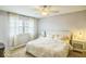 Inviting bedroom with neutral colors, bright window, and comfortable bed at 6133 Buttonwood Dr, Noblesville, IN 46062