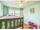 Serene bedroom with bunk beds, natural light, and ample storage space at 6133 Buttonwood Dr, Noblesville, IN 46062