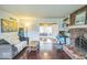 Inviting living room featuring a brick fireplace, comfortable seating, and stylish decor at 6133 Buttonwood Dr, Noblesville, IN 46062