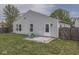 Home's backyard with patio area including outdoor seating and a privacy fence at 6212 Monteo Dr, Indianapolis, IN 46217