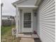 Inviting home entrance featuring a decorative wreath and charming curb appeal at 6212 Monteo Dr, Indianapolis, IN 46217