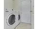 Bright laundry room featuring washer and dryer units at 6212 Monteo Dr, Indianapolis, IN 46217