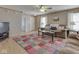 Bright living room features wood-look floors and two cozy sofas at 6212 Monteo Dr, Indianapolis, IN 46217