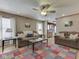 Cozy living room showcasing wood-look flooring, comfortable seating and an open floorplan at 6212 Monteo Dr, Indianapolis, IN 46217