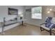 Bright office space with wooden floor and large window at 6212 Monteo Dr, Indianapolis, IN 46217