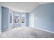 Carpeted bedroom with bay windows providing ample natural light and cozy atmosphere at 6259 Bishops Pond Ln, Indianapolis, IN 46268