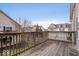 Wooden deck overlooks a serene neighborhood, perfect for outdoor enjoyment at 6259 Bishops Pond Ln, Indianapolis, IN 46268