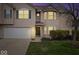 Charming home with an attached two-car garage, bay window, and a well manicured lawn at 6259 Bishops Pond Ln, Indianapolis, IN 46268