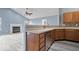 Close-up kitchen view showcasing countertops and stainless steel dishwasher at 6259 Bishops Pond Ln, Indianapolis, IN 46268