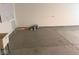 Spacious garage with concrete flooring and white walls, offering ample storage space at 6479 Enclave Blvd, Greenwood, IN 46143
