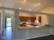 Kitchen featuring an island, stainless steel appliances, and an open layout at 6479 Enclave Blvd, Greenwood, IN 46143