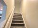 Carpeted staircase leading up to the next level of the home at 6479 Enclave Blvd, Greenwood, IN 46143