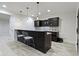 Basement bar area with pendant lighting, stylish bar stools, and ample counter space at 6590 W Deerfield Dr, Zionsville, IN 46077