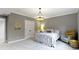 Cozy bedroom featuring a metal bed, crown molding, and a cheerful welcome pillow at 6590 W Deerfield Dr, Zionsville, IN 46077
