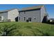 Image shows the backyard with some of the home's exterior at 6917 Wheatley Rd, Whitestown, IN 46075
