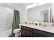 Bathroom with a double vanity, shower-tub combo, and modern fixtures at 6917 Wheatley Rd, Whitestown, IN 46075