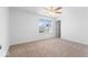 Empty bedroom featuring carpeted floor, ceiling fan and a window at 6917 Wheatley Rd, Whitestown, IN 46075