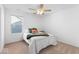 Bedroom with a ceiling fan and one window overlooking the outside at 6917 Wheatley Rd, Whitestown, IN 46075