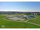 A vibrant community park showcasing tennis courts, playgrounds, and scenic green spaces for recreation at 6917 Wheatley Rd, Whitestown, IN 46075