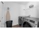 Laundry room with stainless steel washer and dryer at 6917 Wheatley Rd, Whitestown, IN 46075