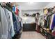 Spacious walk-in closet with shelving, hanging rods, and dresser at 6917 Wheatley Rd, Whitestown, IN 46075