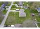 An aerial view showing the location in a quiet neighborhood with well-maintained landscaping at 712 Valley Dr, Anderson, IN 46011