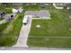 Aerial view of the property showcasing well-manicured lawn and outdoor living area at 712 Valley Dr, Anderson, IN 46011