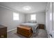 Bedroom features large windows, plush carpet, and ample closet space for comfortable living at 712 Valley Dr, Anderson, IN 46011