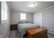 Cozy bedroom with plush carpeting, large windows, and ample closet space for comfortable living at 712 Valley Dr, Anderson, IN 46011