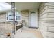 Inviting front porch with seating, creating a cozy entrance to the home at 712 Valley Dr, Anderson, IN 46011