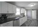 Well-equipped kitchen featuring stainless steel appliances and modern cabinetry at 712 Valley Dr, Anderson, IN 46011