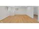 Finished basement boasts hardwood floors, plenty of natural light and a clean, modern, neutral color palette at 7171 N Orchard Dr, Indianapolis, IN 46236