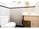 Compact bathroom with a clean design, tiled walls, and essential fixtures in a functional layout at 720 22Nd St, Columbus, IN 47201