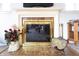 Close-up of fireplace with tiled hearth and mantel, and decorative accents at 720 22Nd St, Columbus, IN 47201