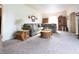 Open living room featuring comfortable furnishings, neutral walls and carpet, and great natural light at 720 22Nd St, Columbus, IN 47201