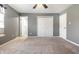 Bedroom with closet, neutral carpet and access to two hallways at 7230 Carrie Dr, Indianapolis, IN 46237