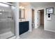 Well-lit bathroom features a glass shower, vanity, and neutral color scheme at 7319 Deerberg Dr, Indianapolis, IN 46259