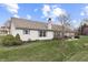 Large backyard with green space, mature landscaping, and a comfortable patio at 7441 Sugar Pine Ct, Avon, IN 46123