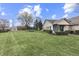 Spacious backyard featuring lush lawn, storage shed and mature trees for outdoor enjoyment at 7441 Sugar Pine Ct, Avon, IN 46123