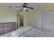 A serene bedroom with a ceiling fan, closet, and plenty of drawer space at 7441 Sugar Pine Ct, Avon, IN 46123