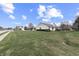 Charming single-story home with a well-manicured lawn and a classic suburban street view at 7441 Sugar Pine Ct, Avon, IN 46123