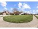 Expansive front yard featuring a well-manicured lawn and charming home exterior at 7441 Sugar Pine Ct, Avon, IN 46123