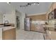 Bright kitchen featuring stainless steel appliances, light wood cabinets, and a light-filled breakfast nook at 7441 Sugar Pine Ct, Avon, IN 46123