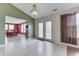 The living room connects to the dining room and features French doors to let in natural light at 7441 Sugar Pine Ct, Avon, IN 46123