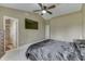 Spacious main bedroom with ensuite bathroom, ceiling fan, and large windows at 7441 Sugar Pine Ct, Avon, IN 46123