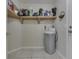 Pantry features shelving for storing items and a water softener at 7441 Sugar Pine Ct, Avon, IN 46123