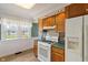 Charming kitchen featuring modern appliances and ample cabinet space at 844 Blanchard St, Shelbyville, IN 46176