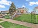 Front yard with a well-kept lawn, a charming home, and a convenient sidewalk at 87 S 10Th Ave, Beech Grove, IN 46107